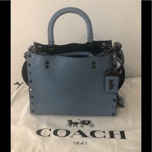 Coach Rogue 25 in Slate Blue with Rivets